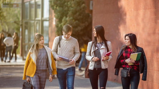 Students holding notebooks